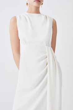 {@@=Ist.Core.Helpers.StringHelper.ToProperCase("The graceful composure of this midi dress balances a tactile cowl neck with a bow-tie back and gathered tuck waist, creating a languid drape that offers dimensional detailing to the minimalistic ensemble. Pair this piece with vibrant accessories and tonal stilettos for a timeless approach to occasion dress codes.Cowl neckTie backGathered waistMidi hemlineMesh materialExpertly designed for those 5'3" and under, our Petite pieces are perfectly propor Chic Formal Dress With Gathered Neckline, Feminine Draped Midi Dress For Formal Occasions, Elegant Sleeveless Dress With Ruched Bodice For Formal Occasions, Elegant Sleeveless Dress With Pleated Back, Formal Feminine Draped Midi Dress, Elegant Sleeveless Formal Dress With Ruched Bodice, Elegant Formal Sleeveless Dress With Ruched Bodice, Chic Sleeveless Mini Dress With Gathered Neckline, Sleeveless Pre-draped Dress With Ruched Back