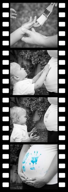 a woman holding a baby in her arms with blue ink on it's stomach