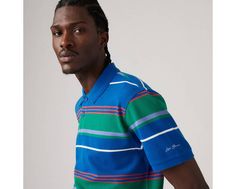 We love polos for many reasons. Chief among them: their unmatched versatility. You can dress them up or down, wear them under or with anything, and they'll always look on point. This Standard Polo Shirt is finished with a Levi's® graphic. The king of easy tops: the polo Streamlined detailing and silhouette for added versatility Crafted with supersoft fabric Finished with selvedge detailing on the neckline With Levi's® cursive script on the sleeve Levi's Green Cotton Tops, Green Levi's Cotton Tops, Blue Casual Polo Shirt With Graphic Print, Cursive Script, Look On, The King, Levi's, That Look, Polo Shirt