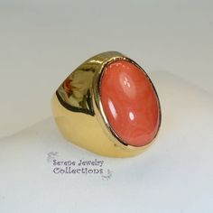 This pleasant vivid Japanese Momo Coral Ring is set in 14k solid gold. Ring Size: 6Total Weight: 12.23 gramsPrecious Metal: 14k solid goldPrecious stones:-Coral Center Stone: 18mm x 13.7mm Gold Ring Vintage, Platinum Diamond Rings, Coral Ring, Solid Gold Ring, Jade Ring, 18k Gold Ring, Vintage Ring, Ring Vintage, Antique Rings