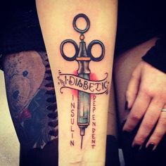 a tattoo on the leg of a woman with a knife and syringon in it