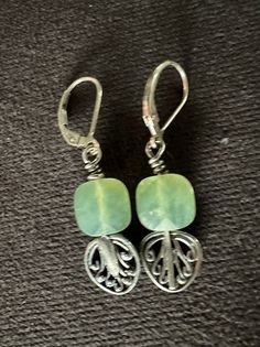 Elegant Prehnite and Bali Sterling Silver earrings featuring lever backs and a 1-inch drop length. Adjustable Silver Jewelry With Lever Back, Green Earrings With French Hook And Adjustable Fit, Green Adjustable Earrings With French Hook, Henderson Nv, Hand Made Jewelry, Sterling Silver Earrings, Jewelry Earrings Dangle, 1 Inch, Silver Earrings