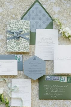 the wedding stationery was done in green and gray