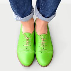 Leather; upper & lining Man-made sole 2.5 cm / 1.0" heel height Handcrafted in Europe Materials: A celebration of bright spring colours, these oxford shoes are built with a slim silhouette design and classic punched detailing. Wear these lace-ups with everything from tailoring to dresses to add a dose of androgynous cool. Material: Tropic Green Soft Leather Laces: Beige & Orange (bonus) Decorations: Brogues, Perforations Sole: Beige #1685 CUSTOMIZEBANNER460991377_ Green Oxford Shoes, Green Shoes Women, Spring Colours, Custom Made Shoes, Oxford Boots, Green Soft, Stage Outfit, Bright Spring, Green Shoes