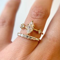 Step back in time with this new band by San Francisco-based Porter Gulch. Featuring a glittering row of asscher cut white diamonds flanked by two tapered baguettes, the Constance is an Art Deco lover's dream. Pair it with an engagement ring or add it to any ring stack that needs a touch of sparkle. Made in San Francisco. 14 karat gold with five asscher cut white diamonds and two tapered baguette white diamonds totaling approximately 0.37 carats (SI1+ clarity, G/H color). Asscher Cut Baguette Diamond Rings, Asscher Cut Diamond Ring With Baguette Diamonds, Fine Jewelry Radiant Cut Baguette Diamond Rings, Lab Grown Diamond Ring With Single Cut Baguette Diamonds, Lab Grown Diamond Rings With Baguette Cut, Lab Grown Diamond Rings With Single Cut Baguette, Fine Jewelry Princess Cut Diamond Ring With Baguette Diamonds, Fine Jewelry Princess Cut Diamond Ring With Baguettes, Wedding Diamond Ring With Baguette And Asscher Cut Diamonds