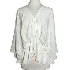 White W/ Metallic Silver Pinstripe Peplum Style V-Neck Blouse Kimono Batwing Sleeve Glam New With Tags, Never Worn! Size Large Please Note That Kimono Style Sleeves Are Open To Waist So Bust Measurements Are Not Possible Please Use Waist Measurements For Fit Measures Approx 17.5” Across Waist, 24” Shoulder To Hem Lightweight White Polyester W/ Shimmering Metallic Silver Pinstripes Pullover Style W/ V-Neckline & Hidden Zip Closure Batwing Style Wide Elbow Length Kimono Sleeves Nipped In Softly Pleated Waist Peplum-Style Hem Going Out, Date Night, Dress Up/Dress Down, Shimmering Blouse, Glitzy Pinstripes Elegant White V-neck Blouse, Chic White V-neck Blouse, Chic Striped V-neck Blouse, White V-neck Top For Brunch, Elegant White V-neck Top For Spring, White Long Sleeve V-neck Top For Spring, Chic White V-neck Top For Spring, Chic White V-neck Top, White Long Sleeve V-neck Top For Summer