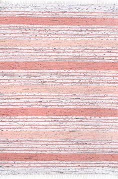 a pink and white striped rug with fringes on the bottom, in different colors