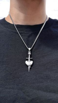 🗡Pierced Heart Necklace 💔 ⛓ 100% solid stainless steel 💦 Waterproof 🚫 NO green skin. NO tarnish. NO rust 🔗 Adjustable from 18”-21” 👽 Features “CYBERSPACE” alien tag Green Skin, Heart Necklace, Cross Necklace, Rust, Silver Necklace, Pendant Necklace, Stainless Steel, Skin, Pendant