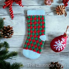 a knitted christmas stocking and ornaments on a wooden background with text overlay that reads, the lavender chair