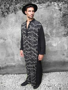 A unique piece of clothing that will spice up your look when attending a festival or cocktail party. This bohemian buttoned down kaftan, printed with white handmade prints, is an original and up to date fashion accessory. Made from a high quality 100% rayon fabric, soft, comfortable and flexible, this is the perfect choice for those hot summer festival nights and for a any other special occasion. My designs feature my original graphics and illustrations. I love working with different color palet Mens Festival Wear, Boho Clothing Men, Burning Man Style, Mens Tunic, Kaftan For Men, Black Kaftan, Burning Man Fashion, Boho Men, Stylish Mens Outfits