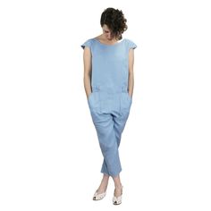 "The Jackie jumpsuit is a casual garment that will please all body shapes. With or without a belt, this low-waisted jumpsuit combines comfort and a feminine touch. Its double cap sleeves highlighting the shoulders, its lovely buttoned back cleavage and its patch pockets adorning the trousers make it an original model to wear from day to night and with endless possibilities. Skill Level : 3 of 4 Sizes : 34 - 46 (2 to 14 US; see conversion chart) New, uncut paper pattern. For 55\" fabrics : 2 1/3 Chic Jumpsuits And Rompers With Pockets For Daywear, Daywear Relaxed Fit Overall Jumpsuits And Rompers, Relaxed Fit Overall Jumpsuits And Rompers For Daywear, Solid Relaxed Fit Jumpsuits And Rompers For Daywear, Relaxed Fit Overalls For Daywear, Casual Daywear Overall Jumpsuits And Rompers, Spring Belted Overall Jumpsuits And Rompers, Casual Fitted Jumpsuits And Rompers For Daywear, Casual Daywear Overalls And Rompers