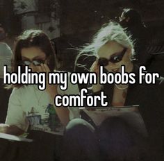 two women sitting next to each other with the words holding my own boos for comfort