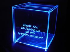 a glowing glass box with the words thank you for joining us on this special occasion