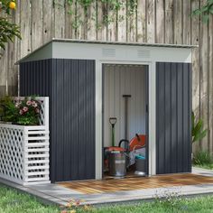 a garden shed with the door open and gardening equipment in it