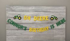 a wooden sign that says oh deere, connor's birthday is here