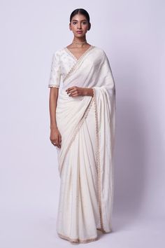 Cream silk crepe saree with sequins and zari hand embroidery. Comes with a padded pure raw silk blouse. - Aza Fashions Embroidered Georgette Pre-draped Saree For Formal Occasions, Cotton Silk Pre-draped Saree With Mirror Work For Reception, White Silk Pre-draped Saree With Mirror Work, Embroidered Pre-draped Saree For Formal Festive Occasions, Traditional Embroidered Pre-draped Saree For Formal Occasions, Anarkali Cotton Silk Pre-draped Saree With Mirror Work, Elegant Pre-draped Saree With Mirror Work In Cotton Silk, Elegant Cotton Silk Pre-draped Saree With Mirror Work, Elegant Pre-draped Cotton Silk Saree With Mirror Work