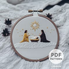 the birth of jesus is depicted in this embroidery pattern