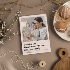 a mother's day card sitting on top of a table next to some eggs