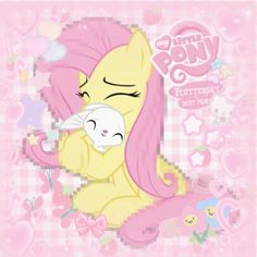 a pink pony hugging another pony on top of a checkered table cloth