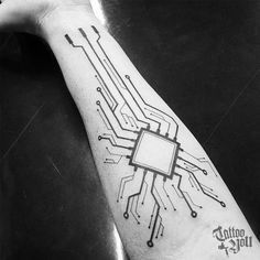 a person's arm with a circuit board tattoo on it