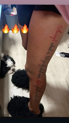 a woman's legs with writing on them