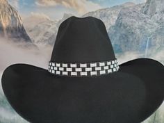 Black, white and gray weave handmade beaded cowboy hat band. The beaded part is 21 1/2 inches long and 7/8 inches wide with black faux leather and straps at the ends for the perfect fit. White Beaded Hat Bands For Festival, White Beaded Hat Bands For Rodeo, White Beaded Hat Band For Rodeo, Southwestern Black Hat Bands For Country Events, White Southwestern Hat Bands For Country Events, Adjustable Beaded White Hat Bands, Handmade Western White Hat Band, Black Beaded Western Hat, Adjustable White Western Hat Bands