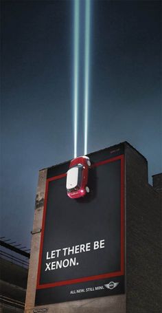 an advertisement for the new xenon car is shown in front of a building