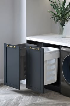 a washer and dryer sitting next to each other in front of a counter