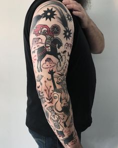 a man with a tattoo on his arm