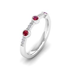 This exquisite diamond and ruby ring is a stunning piece of jewelry that exudes elegance and sophistication. The brilliant diamonds and vibrant rubies are set in a beautifully crafted, creating a luxurious and eye-catching design that is sure to make a statement. Metal: 14K Gold Setting Type: Prong Rhodium Finish: Yes, on White Gold Gemstone Details: Gemstone: Ruby Shape: Round Average Dimensions: 2.50 MM Quantity: 03 Average Cut: Very Good Average Color: Medium to Dark Red Average Clarity: Eye Red Ruby Ring With Single Cut Diamonds, Diamond White Ruby Ring With Diamond Accents, Dazzling Red Diamond Ring With Diamond Accents, Dazzling Red Diamond Ring With Accents, Red Diamond Ring With Accents, White Gold Ruby Ring With Diamond Accent Stones, Red Ruby Diamond Multi-stone Ring, Red Ruby Multi-stone Ring With Diamonds, Luxury Diamond Ring With Lab-created Ruby Accents