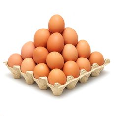 an egg carton filled with brown eggs