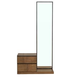 a tall mirror sitting on top of a wooden dresser next to a cabinet with drawers