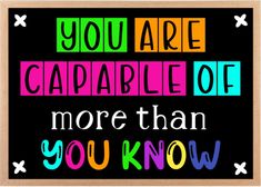 you are capable of more than you know poster with colorful text on black background and white stars