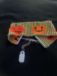 Beaded Bracelet 6 1/2" long with beads then with an adjustable clasp. 1.25" wide Beaded Bracelet, Halloween Shopping, Labour Day, Beading, Jewelry Bracelets, Accessory Gift, Beaded Bracelets, Pet Supplies, Display Homes