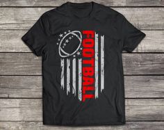 a black shirt with the american flag and football on it