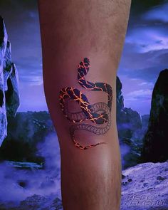 a man's leg with a tattoo on it that has lightning coming out of it