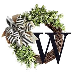 a wreath with the letter w on it