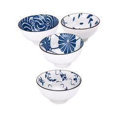 three blue and white bowls sitting next to each other