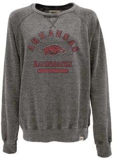 PRICES MAY VARY. Blue84 fan favorite Arkansas Razorbacks women's apparel crewneck sweatshirt This Arkansas women's v notch raglan sleeve crewneck sweatshirt has a high quality vintage distressed screenprint graphic perfect for any Razorbacks fan that is designed and printed in the USA Each Arkansas Razorbacks crewneck sweatshirt is made from a comfortable washed burnout fabric that is a perfect weight for gamedays or cruising the town showing off your Razorbacks pride Great addition to any Arkan University Logo Cotton Sweatshirt Fan Gear, University Logo Cotton Sweatshirt For Fan Gear, University Logo Cotton Sweatshirt For Fans, Cotton Raglan Sleeve Sweatshirt For College, Fall Raglan Sleeve Sweatshirt With Letter Print, Fall Letter Print Raglan Sleeve Sweatshirt, Game Day University Logo Long Sleeve Sweatshirt, Game Day University Logo Sweatshirt, Casual Fan Merchandise Sweatshirt For Fall