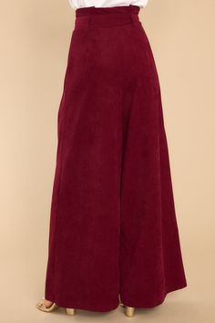 When you have to choose between "those" drab dress pants and these polished burgundy wide leg pants - I know you will choose the latter! You are always Keeping It Classy, in the office and beyond! These pants feature a paper bag style waistline, an adjustable belt, a zipper closure, and very flowy legs. Model is wearing an x-small. • 97% Polyester, 3% Spandex • Hand Wash Cold • Unlined • Imported Burgundy High Waist Wide Leg Pants For Fall, Burgundy Cotton Wide Leg Pants, High Waist Burgundy Wide Leg Pants For Fall, Burgundy Wide Leg Bottoms For Fall, Burgundy Wide-leg Bottoms For Fall, Burgundy Wide Leg Pants For Fall Workwear, Burgundy High-waisted Pants For Fall, Burgundy Wide Leg Pants, Burgundy Corduroy Pants