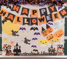 a bulletin board with halloween decorations on it