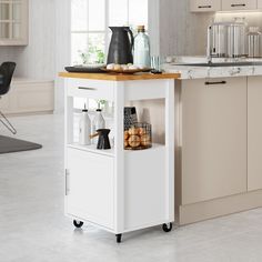 a kitchen island cart with food on it