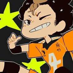 a drawing of a boy in an orange shirt with five stars around him and one star above his head