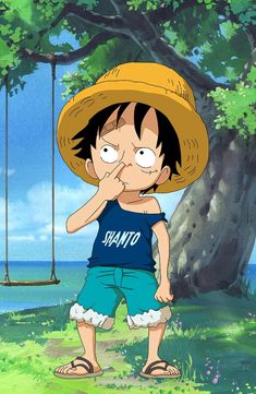 the cartoon character is wearing a straw hat and blue shorts, while standing in front of a tree