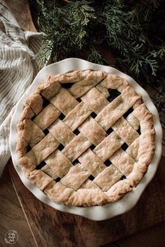 a pie sitting on top of a wooden table