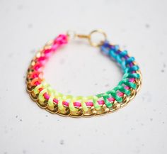 Modern silky luster rainbow braided bracelet made with silver or gold tone lightweight chain and neon colorful cord.Available lengths of bracelet: approx; 19 cm long (7 1/2 inches) including losster claspapprox. 20 cm long (8 inches) including lobster claspapprox. 21,5cm (8 1/2 inches) including lobster claspIf you need another length - don't hesitate to convo me!***This listing is for ONE braided bracelet with silver or gold tone chain!***Find more bracelets here: http://www.etsy.com/shop/daimb Adjustable Multicolor Chain Bracelet For Party, Trendy Handmade Rainbow Braided Bracelets, Handmade Trendy Rainbow Braided Bracelets, Trendy Multicolor Chain Bracelet For Party, Trendy Multicolor Adjustable Chain Bracelet, Trendy Adjustable Multicolor Chain Bracelet, Multicolor Chain Bracelets For Party, Trendy Multicolor Chain Bracelets, Trendy Multicolor Chain Bracelet