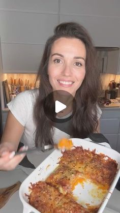 a woman sitting at a table with a plate of food in front of her and the caption reads, how to make lasagna cassero