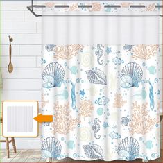 a shower curtain with sea shells and starfishs on it, next to a bath tub