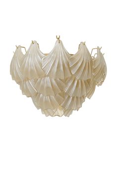 a white chandelier hanging from the ceiling