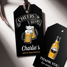 two tags with beer on them that say cheers and beers charlie's 50th birthday